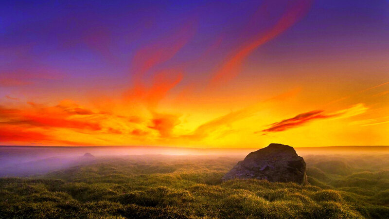Rock on Grassy Hill — Orange, Dramatic
