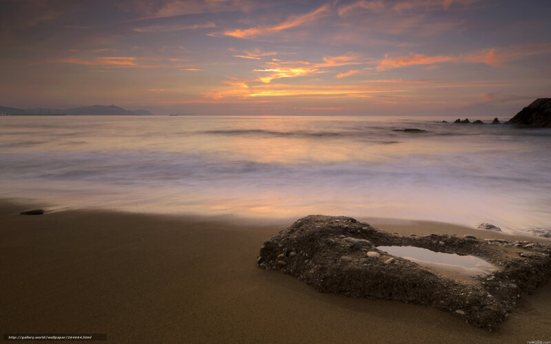 Rock on Sandy Beach — Orange, Serene