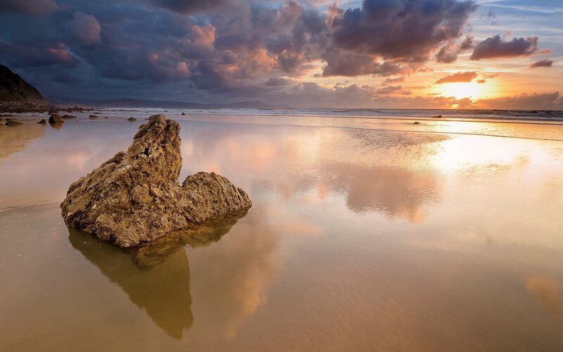Rock on Wet Beach — Orange, Dramatic, Sunset