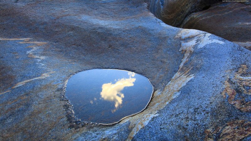 Rock Pool with Cloud Reflection