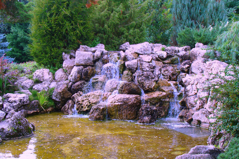 Rock Waterfall in Garden — Green, Serene