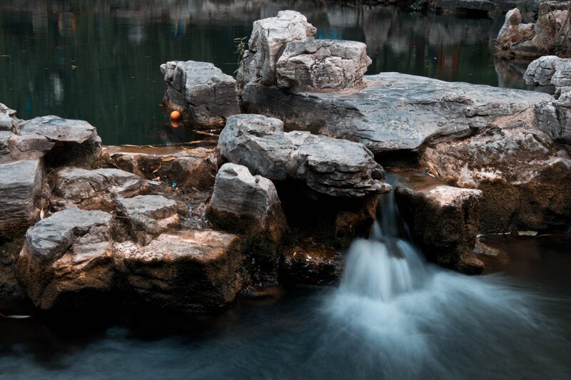 Rock Waterfall in Pond