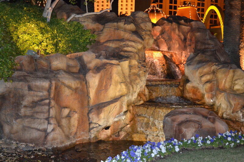 Rock Waterfall with Flowers