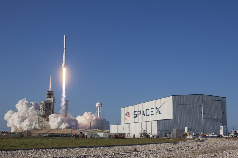Rocket Launch — Blue, Dramatic, Afternoon, Photograph, Launch Pad, Building, Clouds