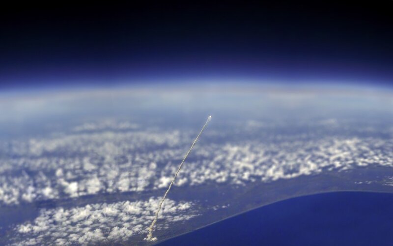 Rocket Launch from Space — Blue