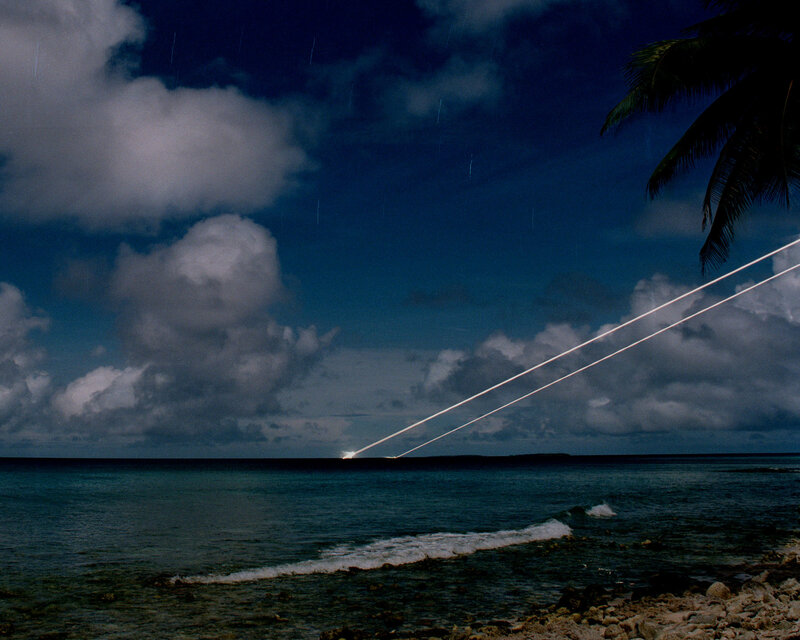 Rocket launch over ocean