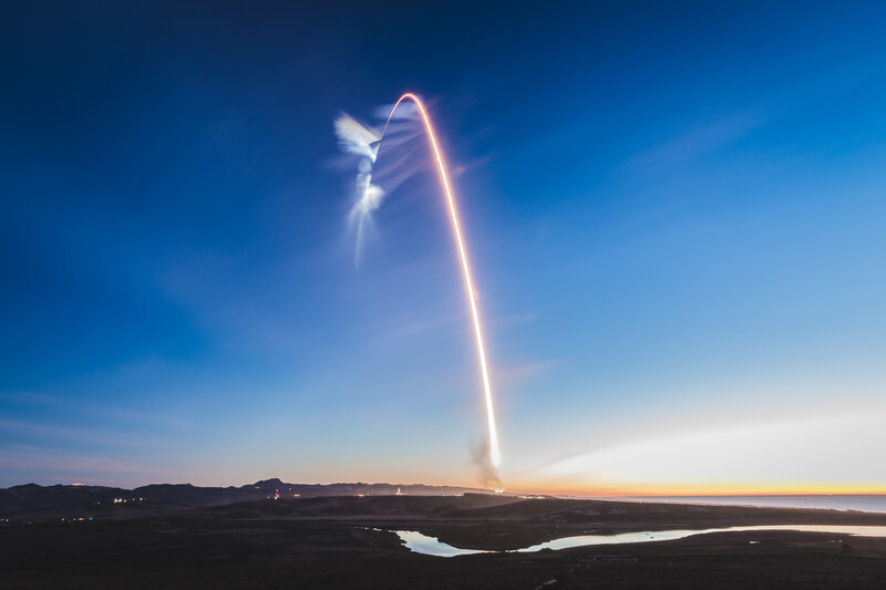 Rocket Launch Trajectory — Blue, Dramatic, Sunset