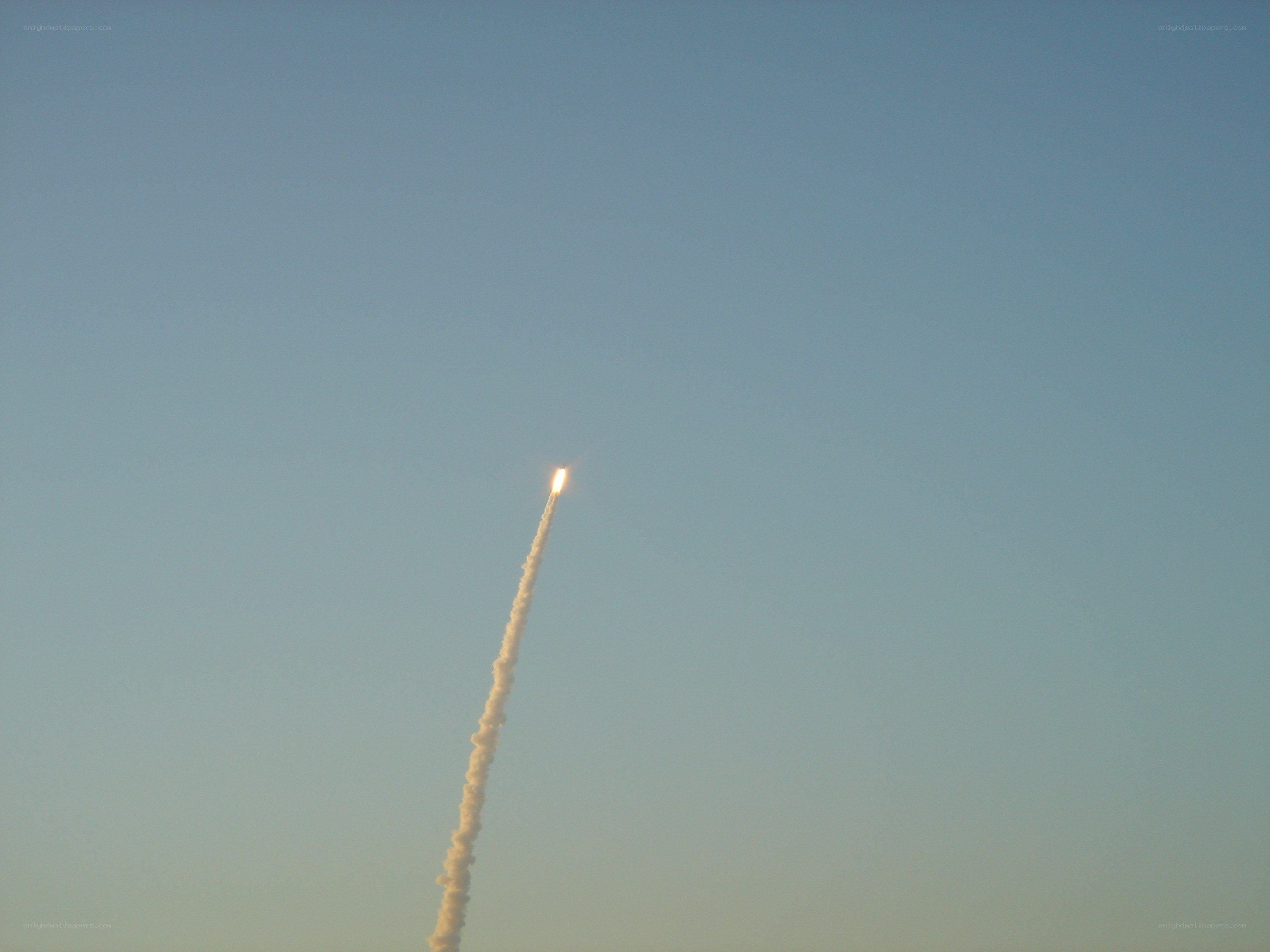 Rocket launching into sky