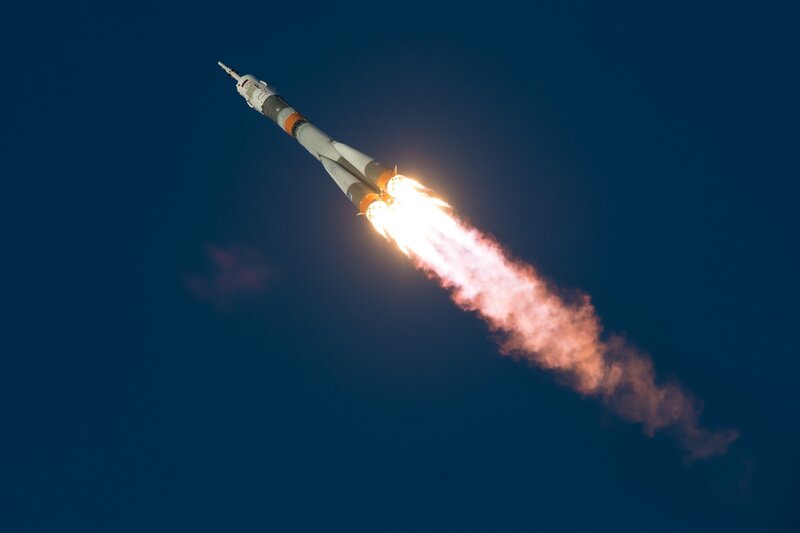 Rocket Launching into Sky — Blue