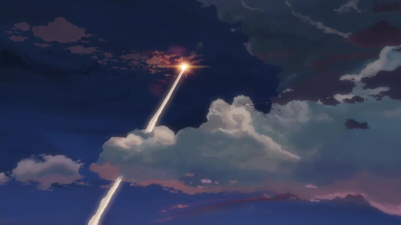 rocket launching into sky