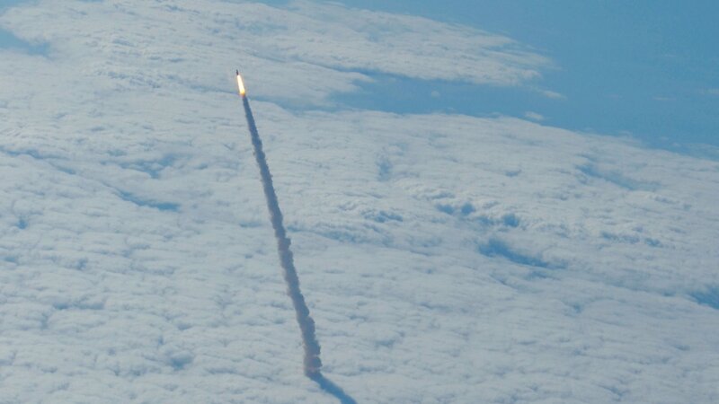 Rocket Launching Through Clouds — Blue, Dramatic, Morning