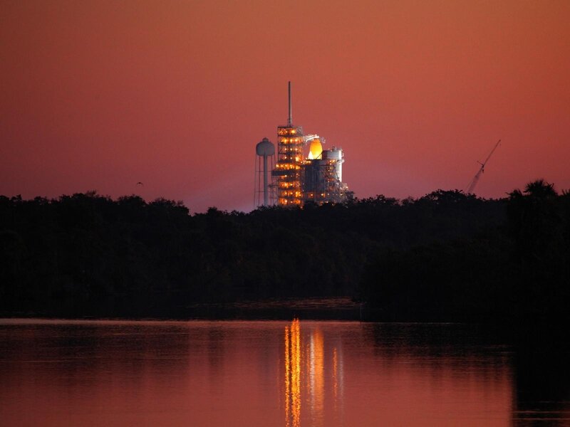 rocket on launch pad at dusk