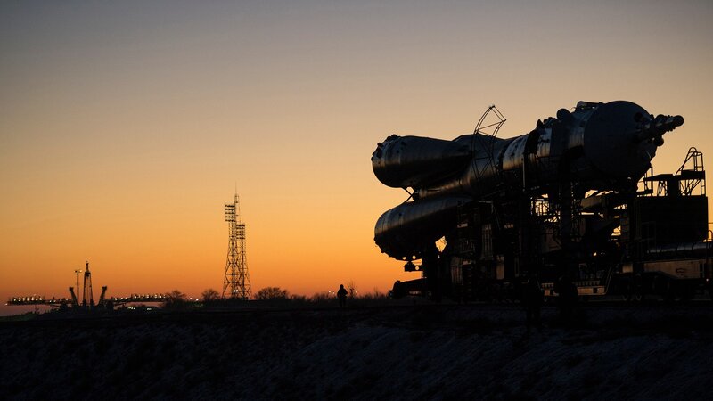 Rocket on Launch Pad — Orange