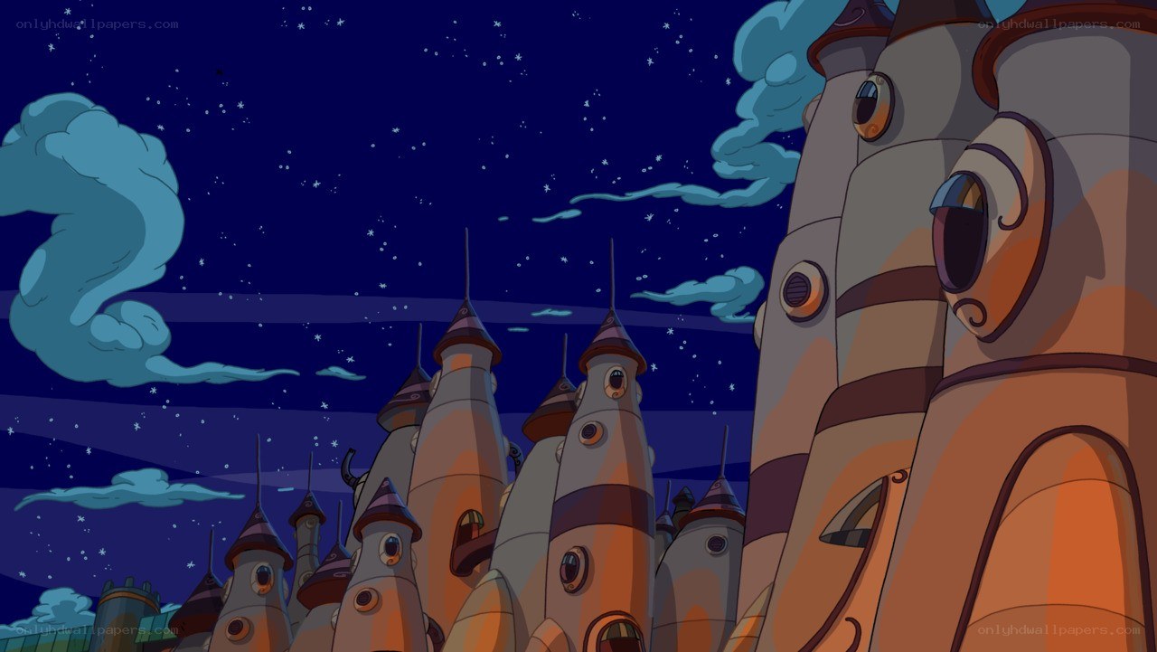 rocket-shaped houses at night