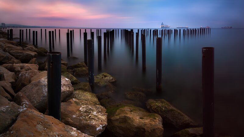 Rocks and Pilings at Sunset