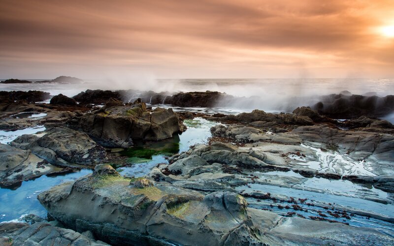 Rocks and waves at sunset