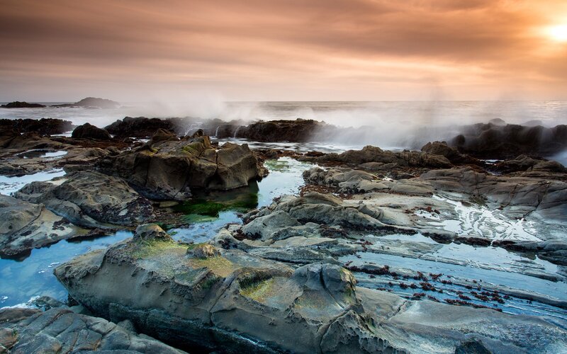 Rocks and waves at sunset