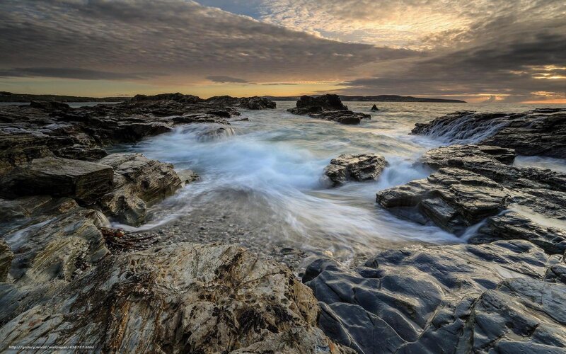 Rocks and waves at sunset
