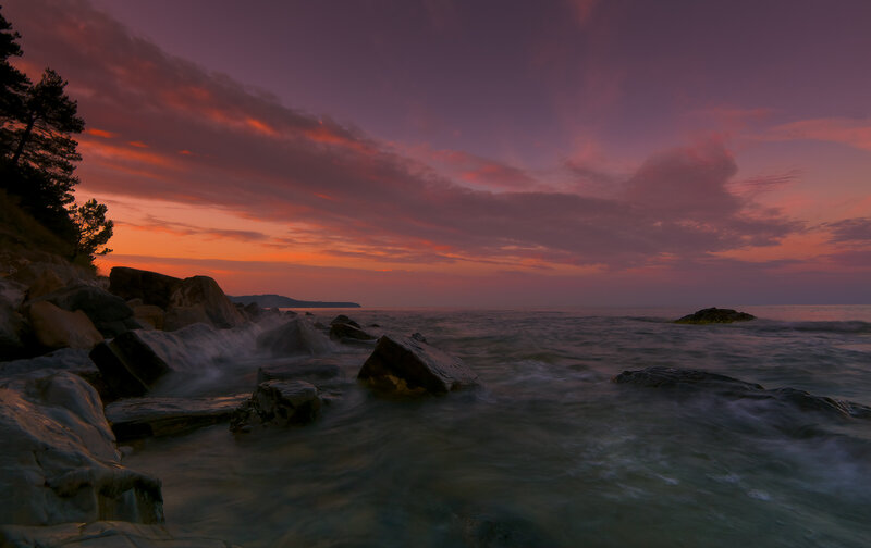 Rocks at Ocean Shoreline — Purple, Serene
