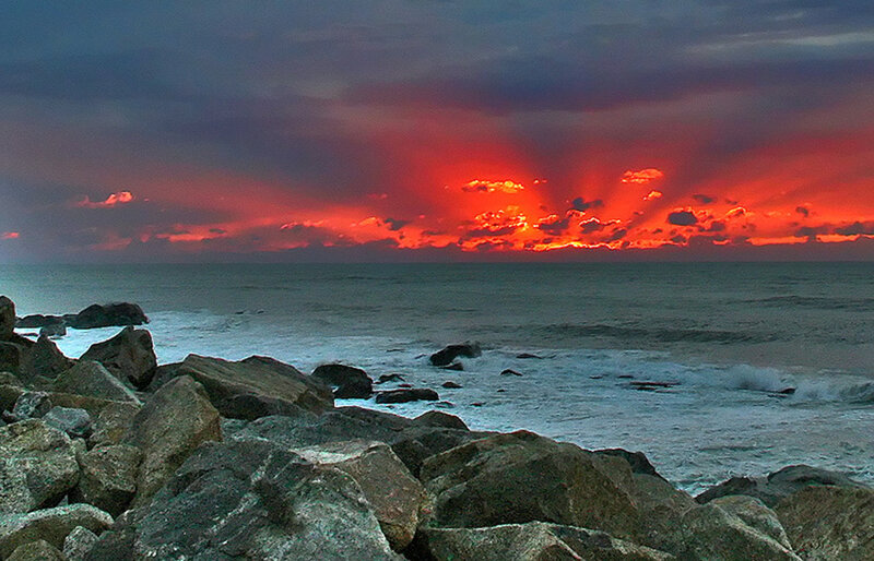 Rocks at Ocean Shoreline — Red