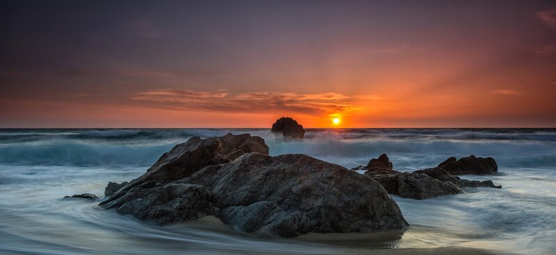 Rocks at Ocean Sunset — Orange