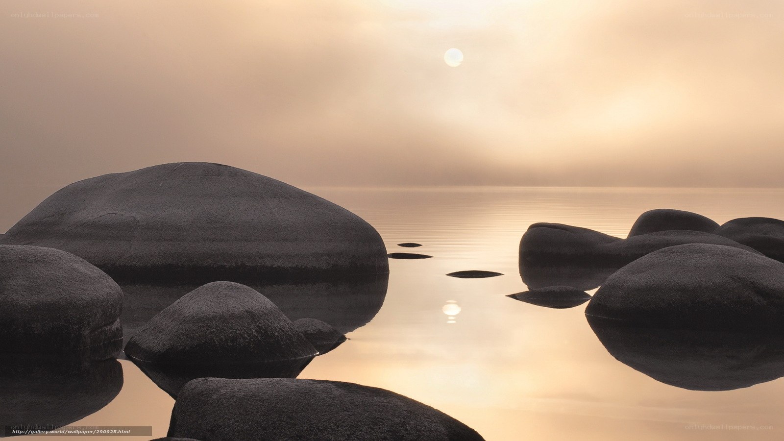 rocks at sunrise by the water