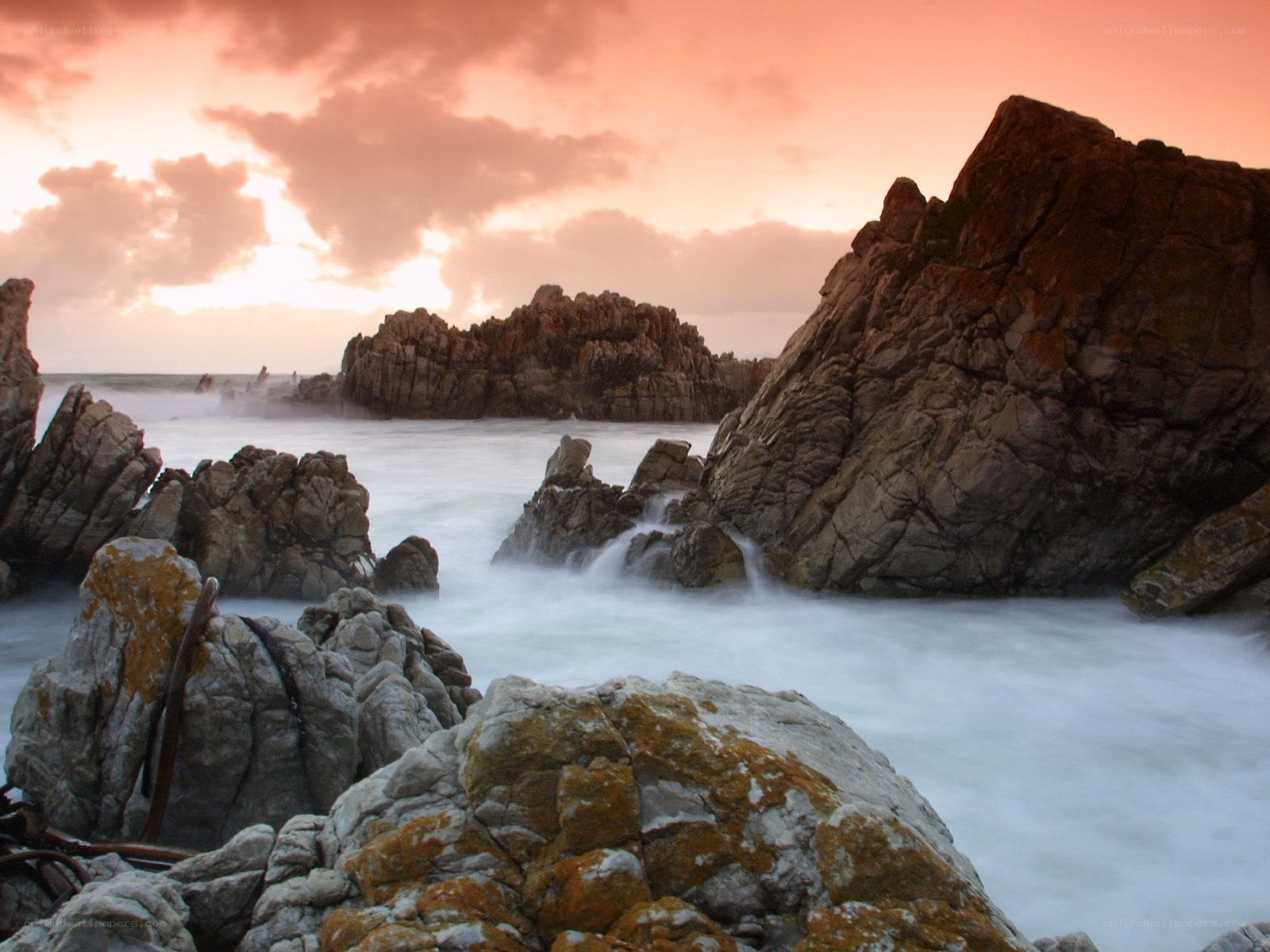 Rocks at sunset by the sea