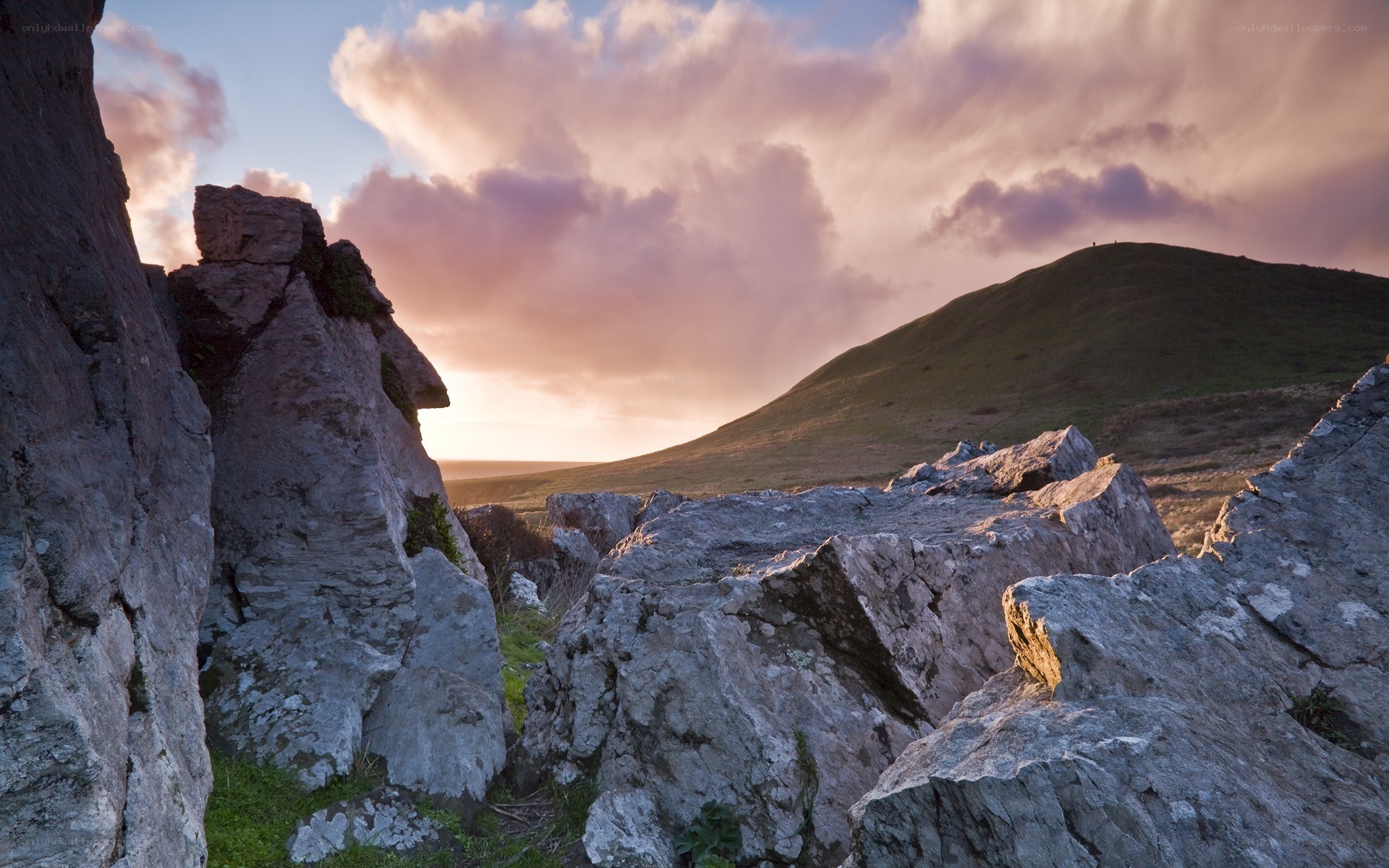 Rocks at sunset on a hill
