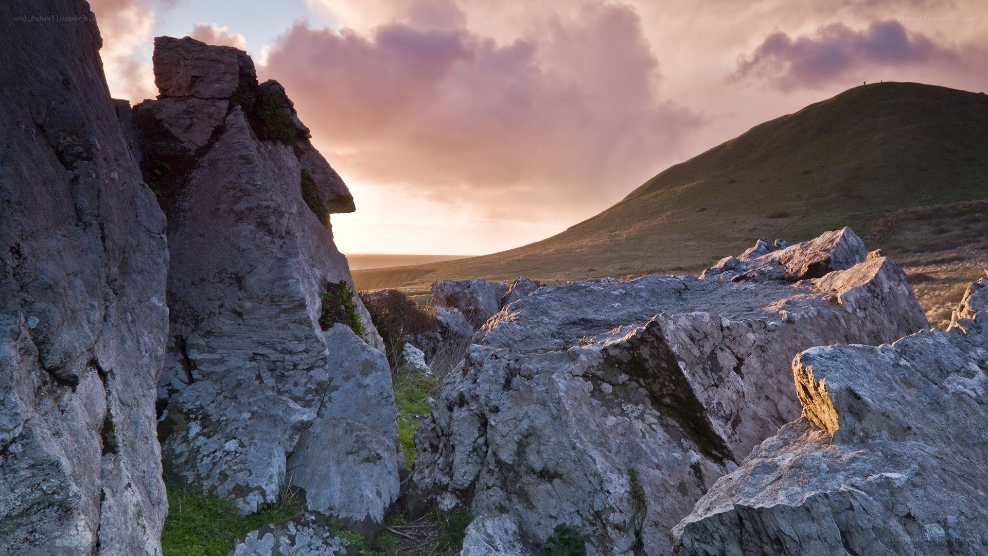 Rocks at sunset on a hill