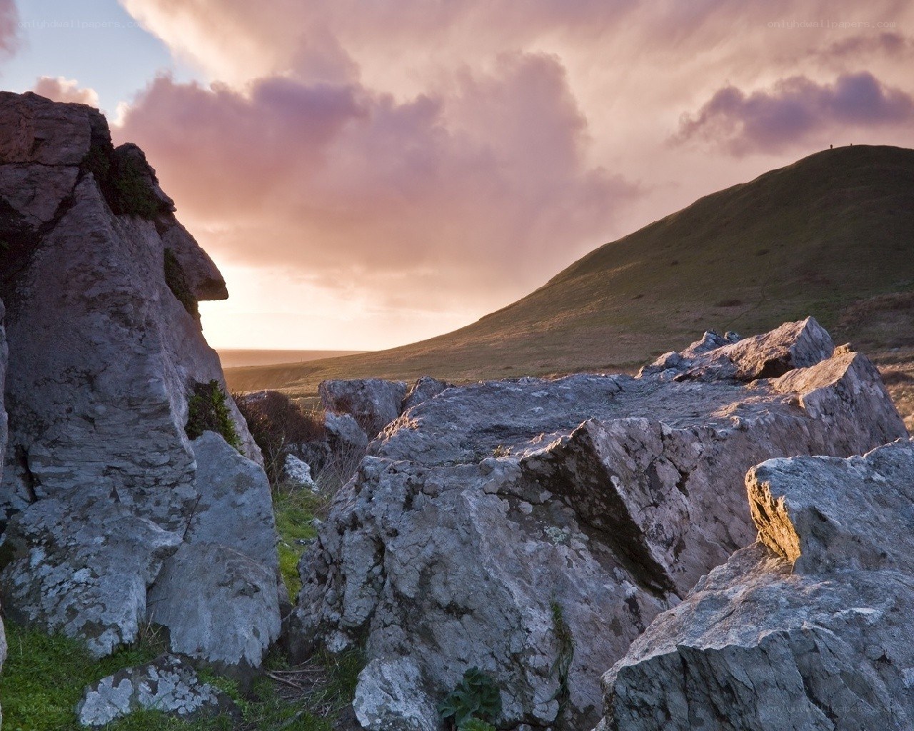 Rocks at sunset on a hillside