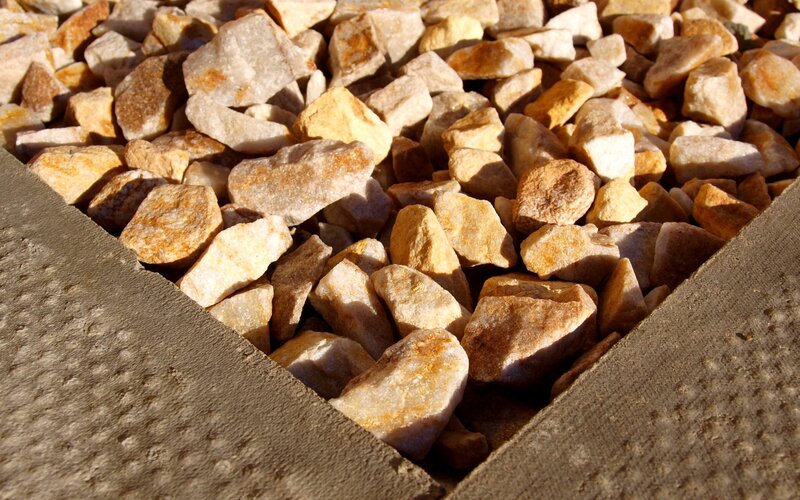 rocks in a concrete frame