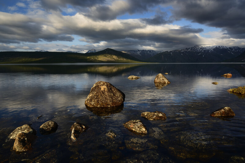 Rocks in Calm Lake — Blue, Dramatic