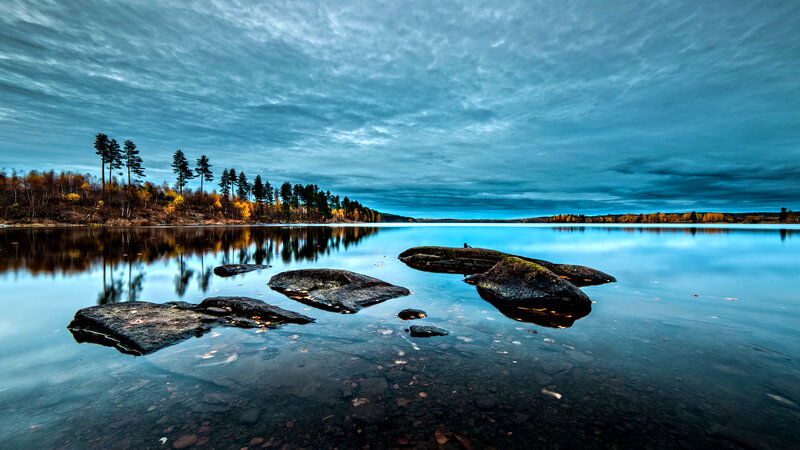 Rocks in Calm Lake — Blue