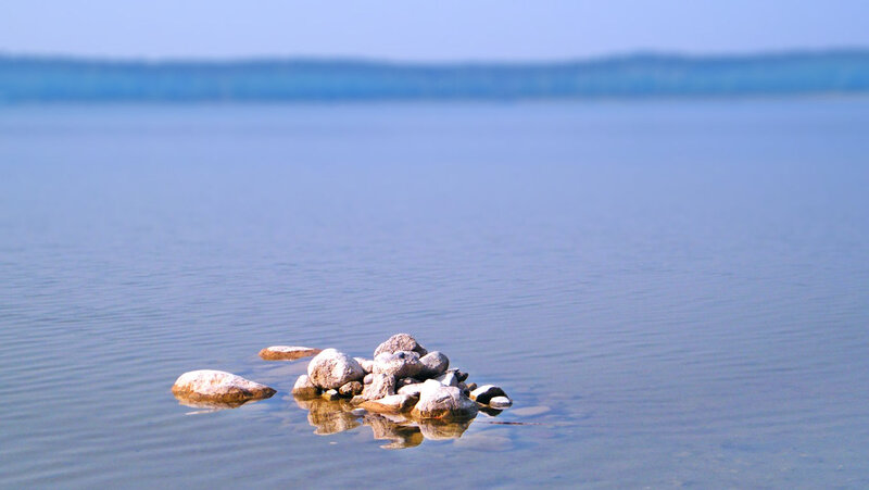 Rocks in Calm Water — Blue, Serene, Afternoon, Photograph