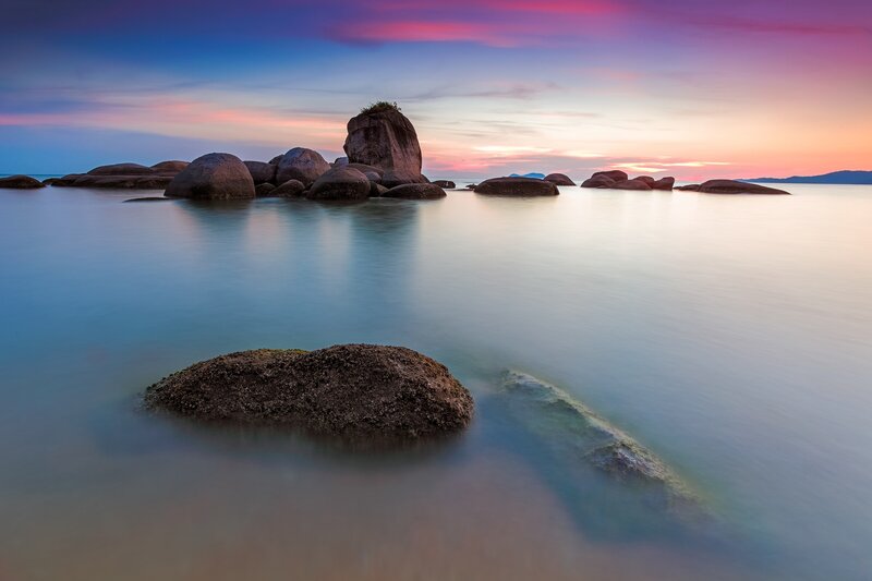 Rocks in Calm Water — Blue, Serene, Sunset, Photograph, Sky, Sea