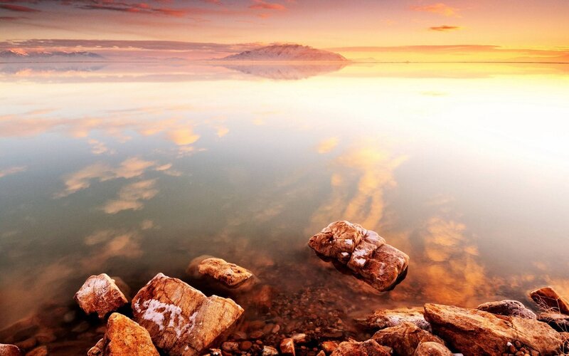 Rocks in Calm Water — Orange, Serene, Sunset, Photograph, Mountain