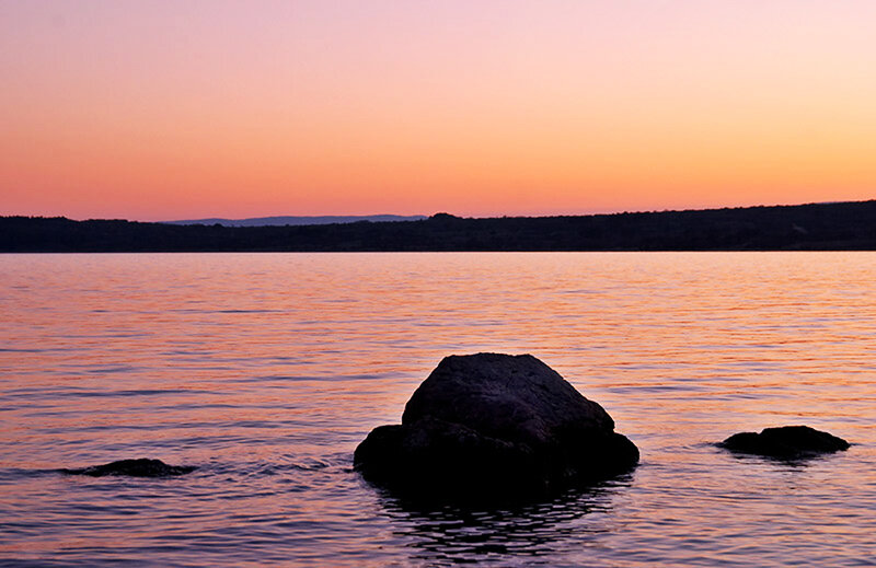 Rocks in Calm Water — Orange