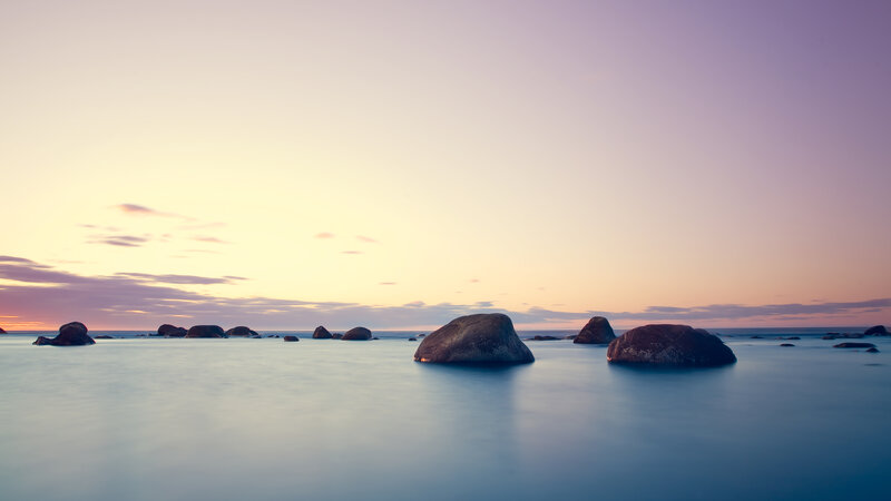 Rocks in Calm Water — Purple, Serene, Sunset, Photograph, Sky, Clouds