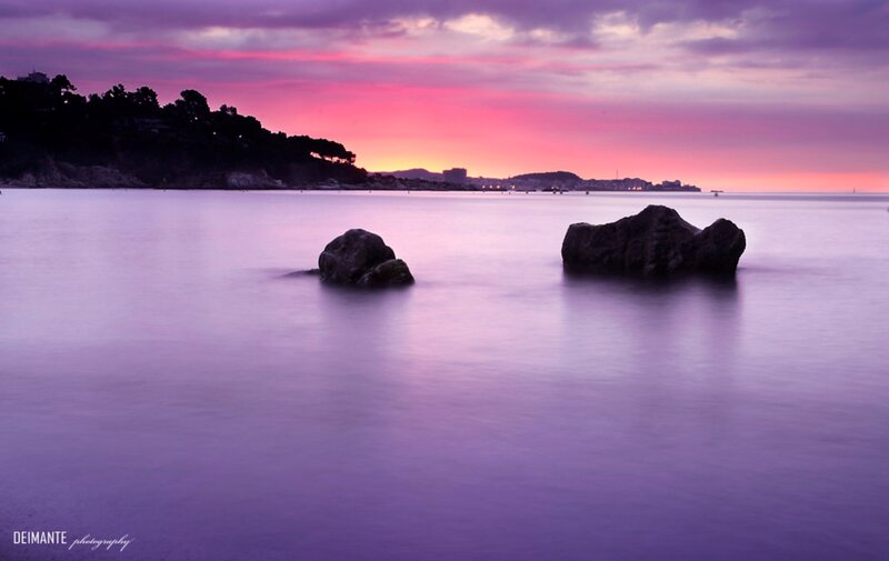 Rocks in Calm Water — Purple, Serene, Sunset, Photograph, Sky