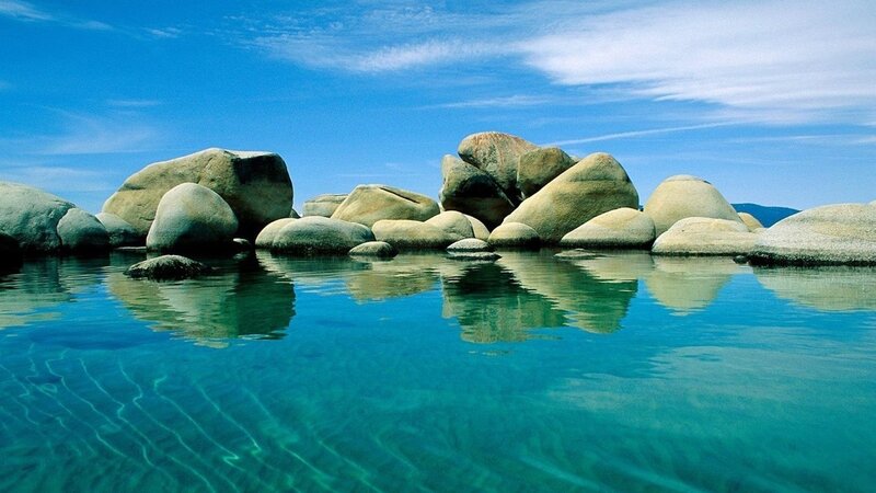 rocks in clear blue water