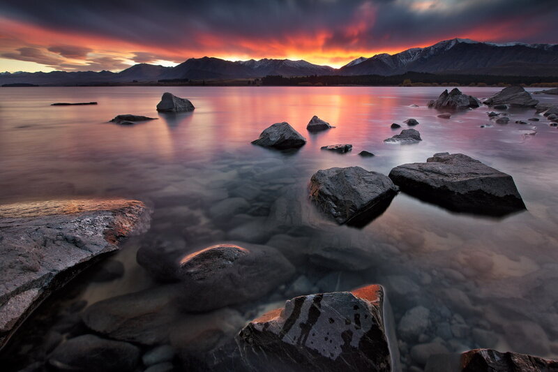 Rocks in Lake at Sunset — Red