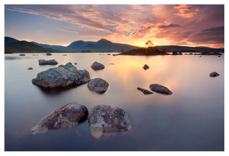 Rocks in Lake at Sunset