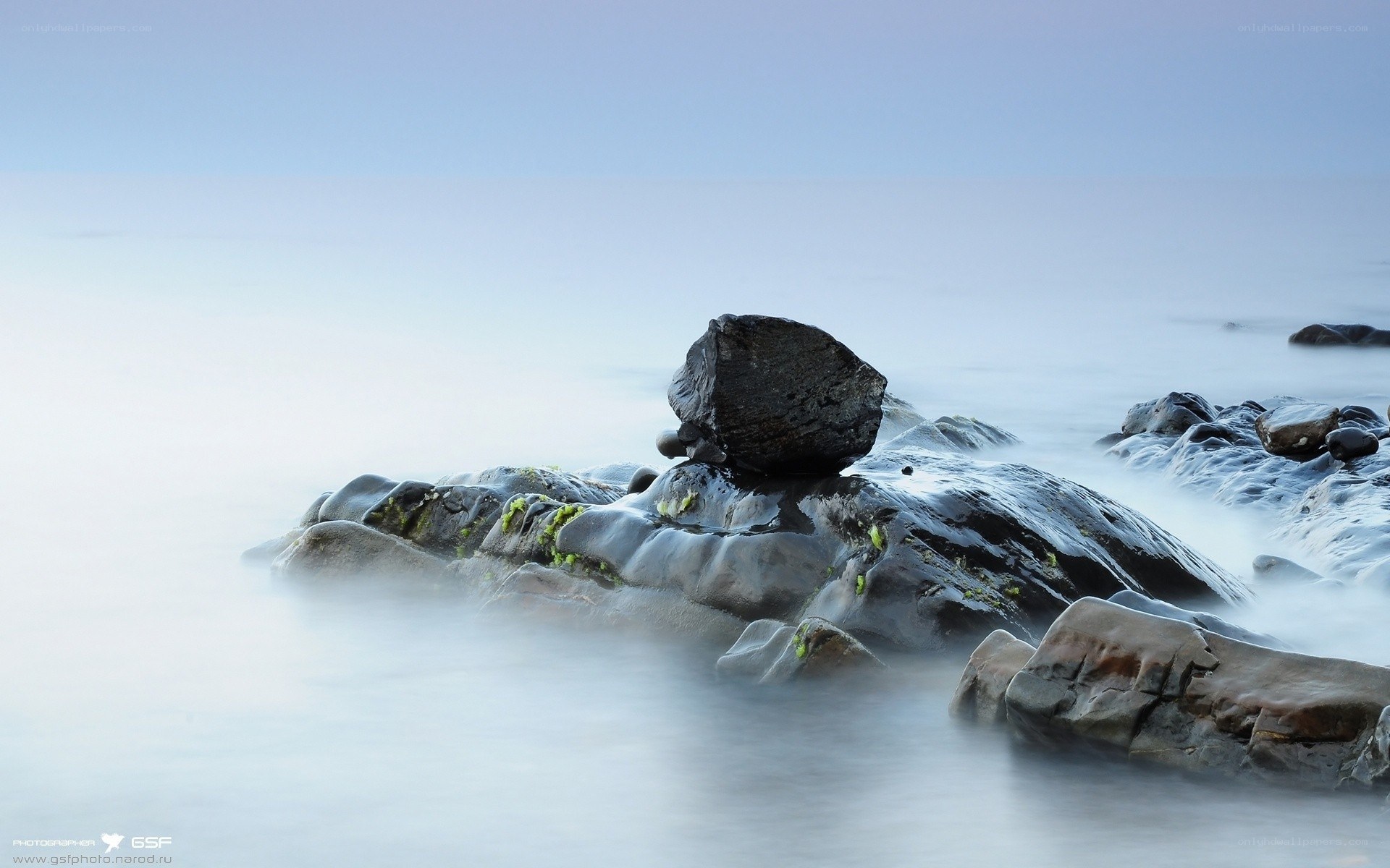 rocks in misty sea