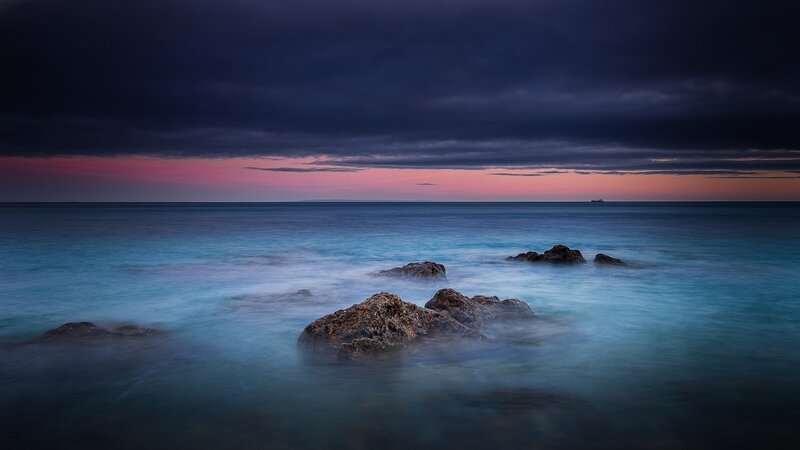 Rocks in Ocean at Dusk — Blue, Dramatic