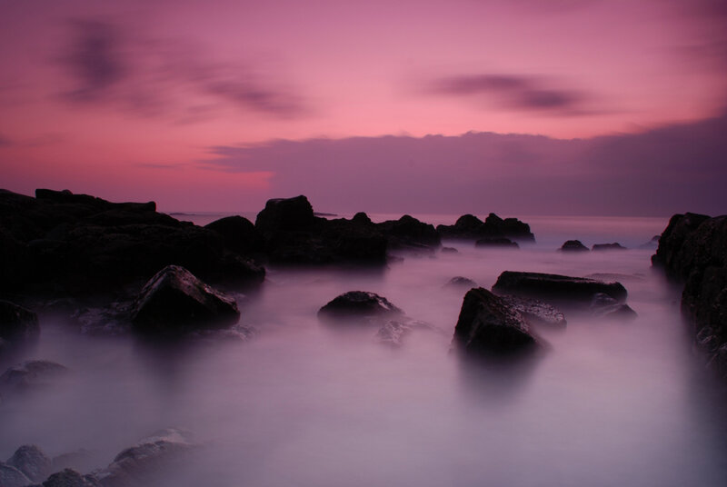 Rocks in Ocean at Dusk — Purple, Serene, Sunset, Photograph, Sky