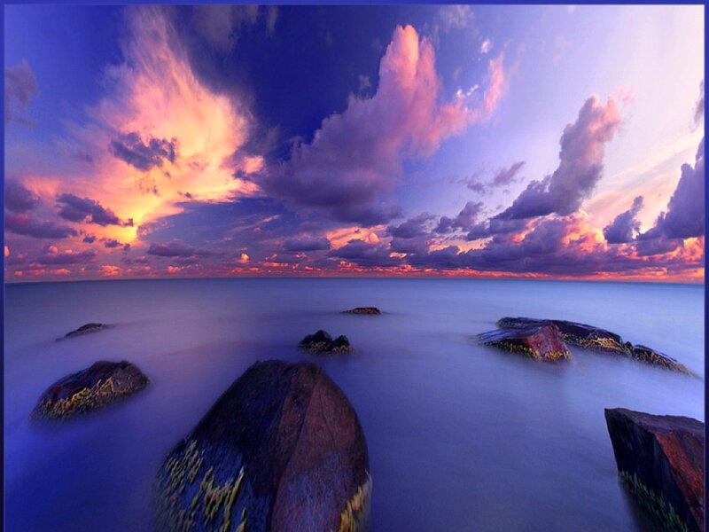 Rocks in Ocean at Sunset — Blue, Dramatic, Photograph, Clouds, Sky