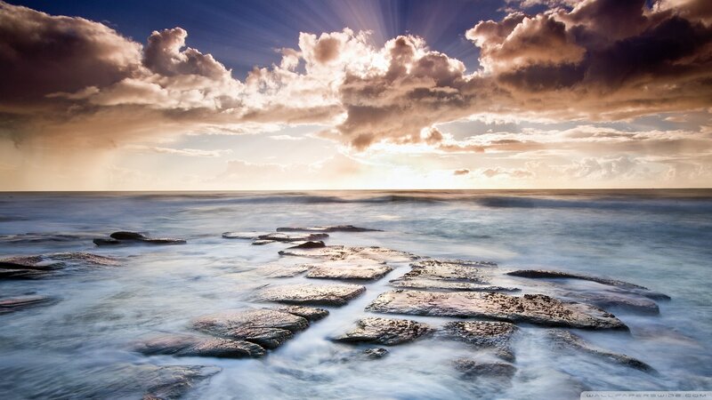 Rocks in Ocean at Sunset — Blue, Dramatic, Photograph, Clouds