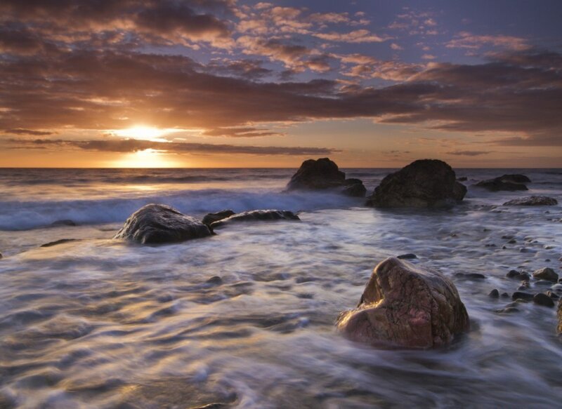 Rocks in Ocean at Sunset — Orange, Serene, Photograph, Sky, Clouds