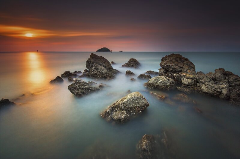 Rocks in Ocean at Sunset — Orange, Serene, Photograph, Sky, Island