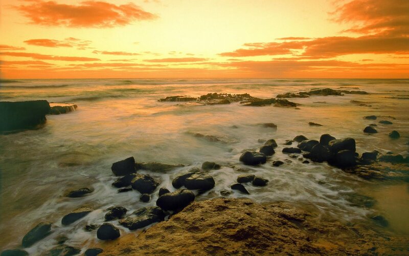 Rocks in Ocean at Sunset — Orange, Serene, Photograph